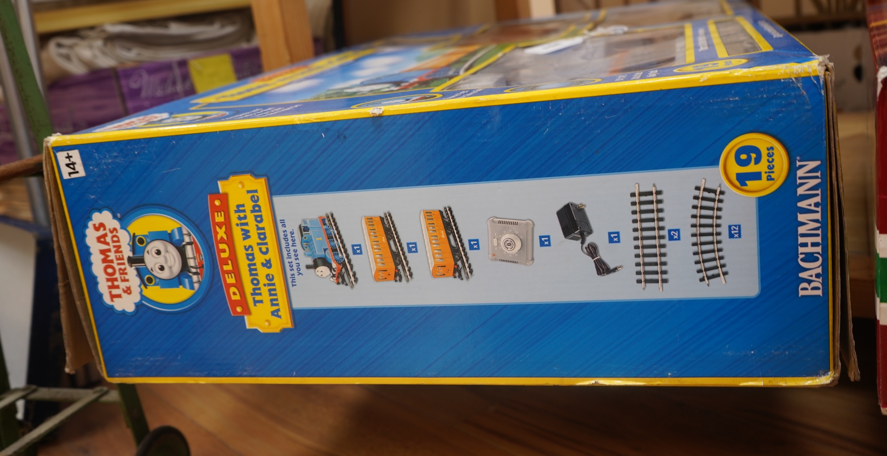 A boxed Bachmann G scale (45mm gauge) Thomas the Tank Engine train set (90068), comprising Thomas with the coaches Annie and Clarabel, track sections and controller. Condition - good, minor damage to the box.
